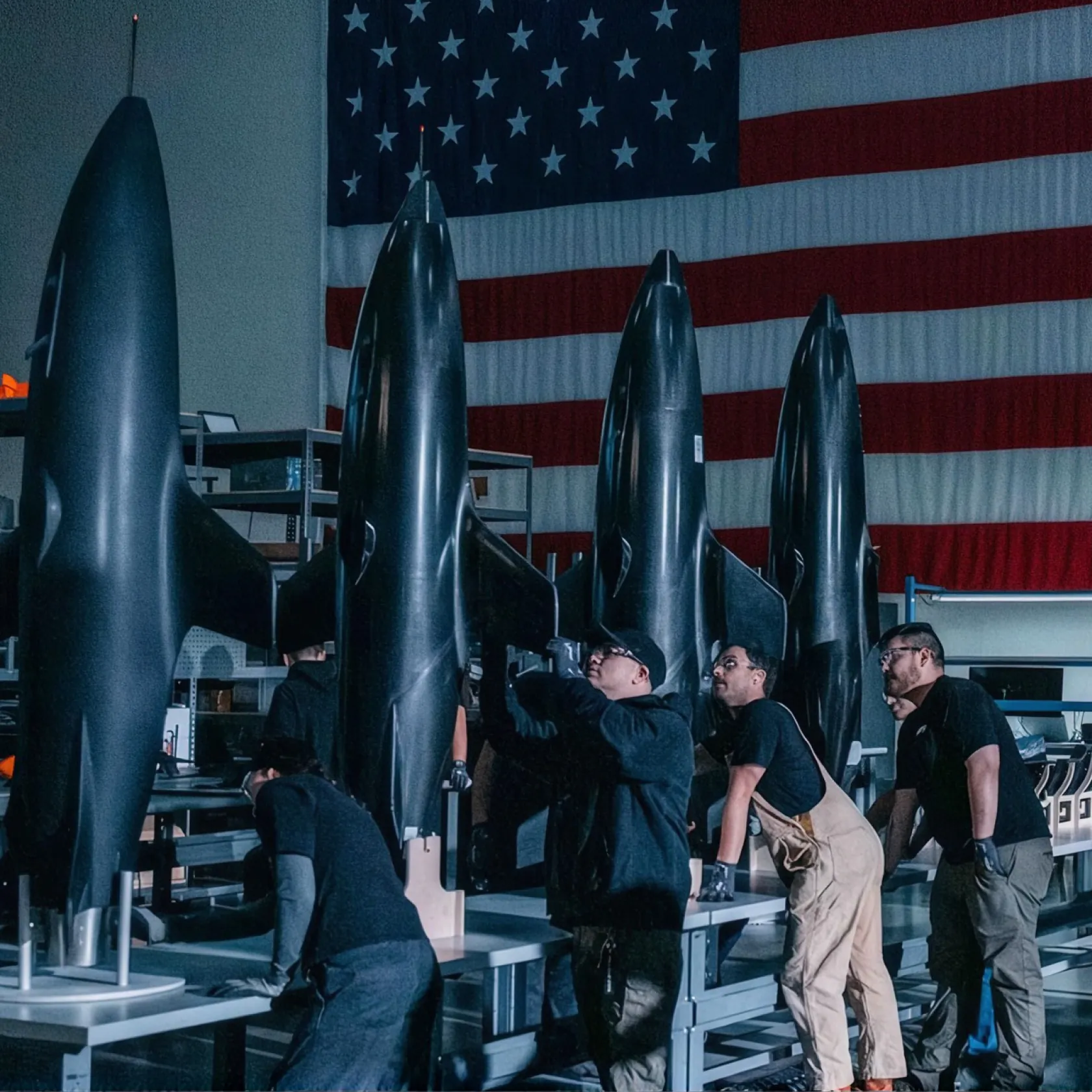 Mach Industries team working on aircraft in their facility